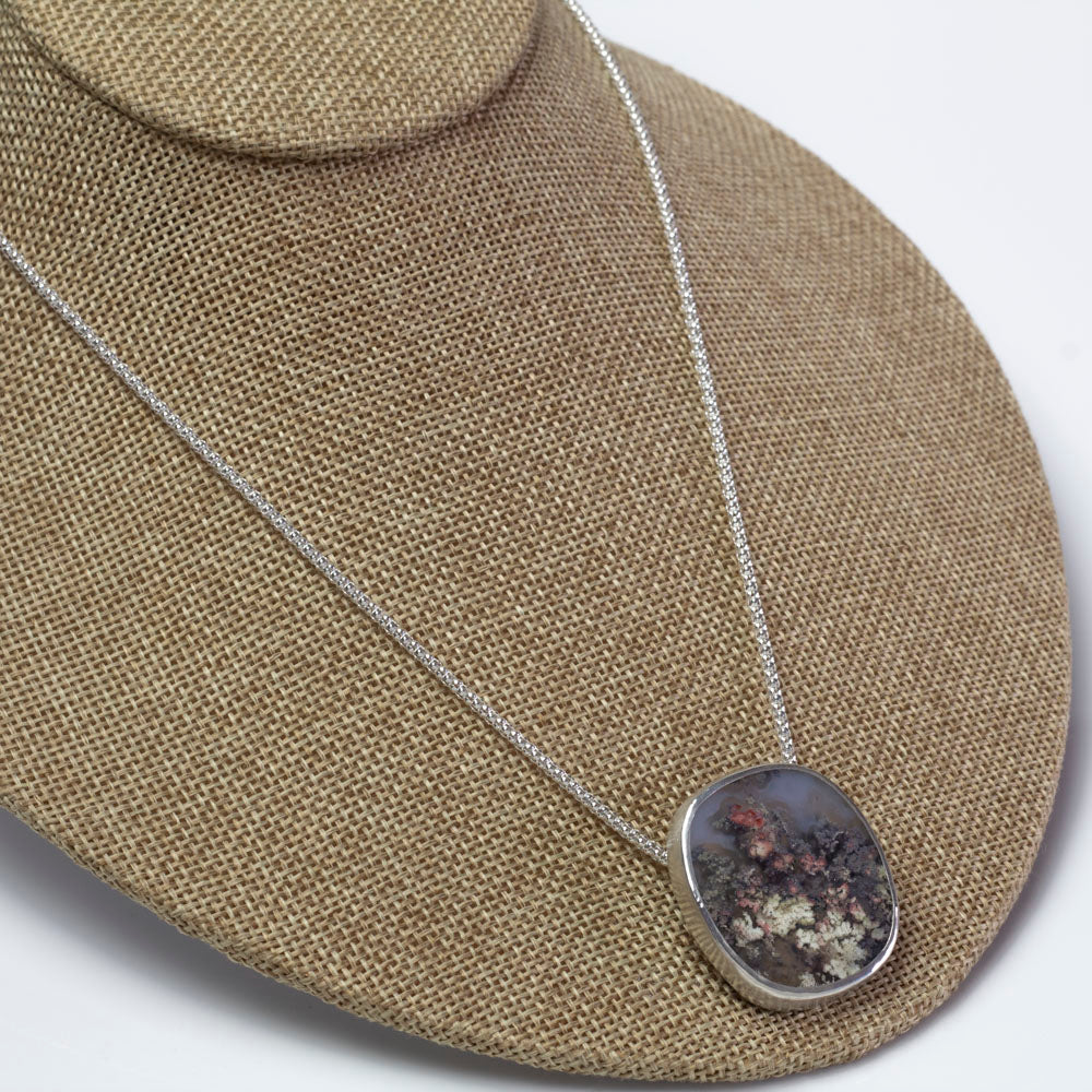 Sterling silver pendant with oval dendritic agate on 18 inch chain