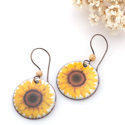 Round sunflower enamel earrings with photographic detail, copper base, and crazy lace agate bead accents on ear wires