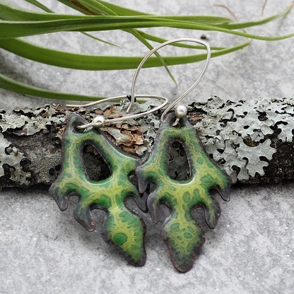 Green kiln-fired enamel frond earrings on copper with sterling silver or niobium ear wires, handmade by Divella Designs in Vermont.