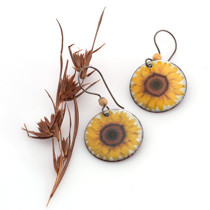 Round sunflower enamel earrings with photographic detail, copper base, and crazy lace agate bead accents on ear wires