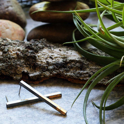 Modern silver and gold Keum Boo post earrings with linear design