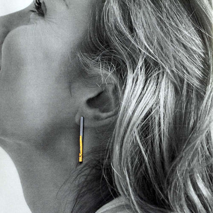 Modern silver and gold Keum Boo post earrings with linear design