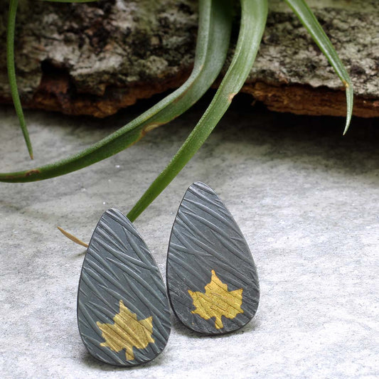 Keum Boo earrings with 24k gold maple leaf on textured silver teardrops
