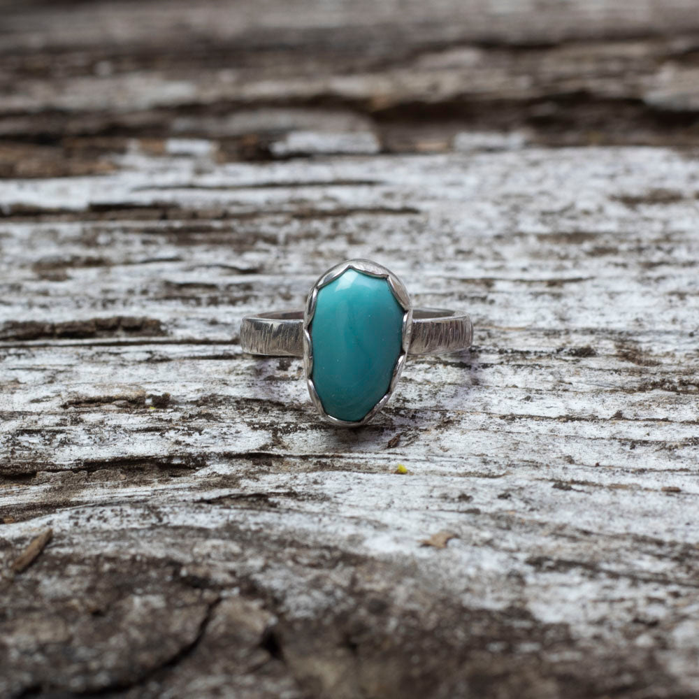 Sterling silver ring with King’s Mine turquoise in scalloped bezel on textured band, handmade size 8 ring