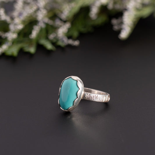 Sterling silver ring with King’s Mine turquoise in scalloped bezel on textured band, handmade size 8 ring