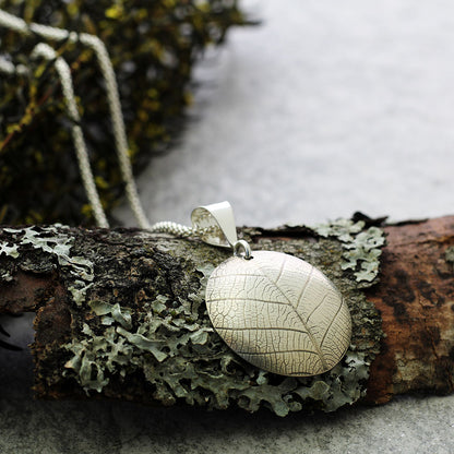 Silver Leaf Print Necklace on bark