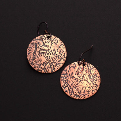 Copper mushroom etched earrings with niobium ear wires, nature-inspired jewelry