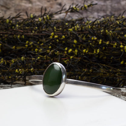 Sterling silver cuff bracelet with medium oval nephrite jade