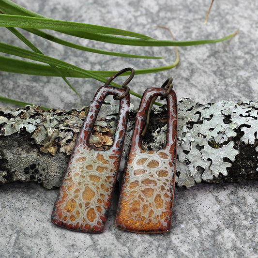 Earth-toned enamel earrings with niobium ear wires and organic branching pattern