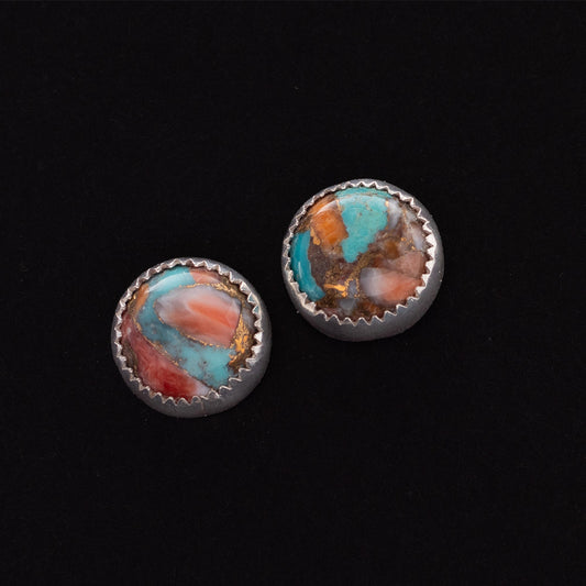 Sterling silver stud earrings with 10mm spiny turquoise stones in vibrant swirls of teal, coral, and rust, handcrafted with a serrated bezel setting.