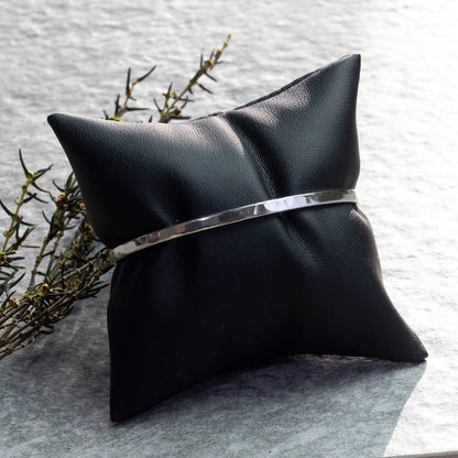 Sterling silver hammered cuff bracelet with a minimalist design, perfect for stacking, handmade jewelry