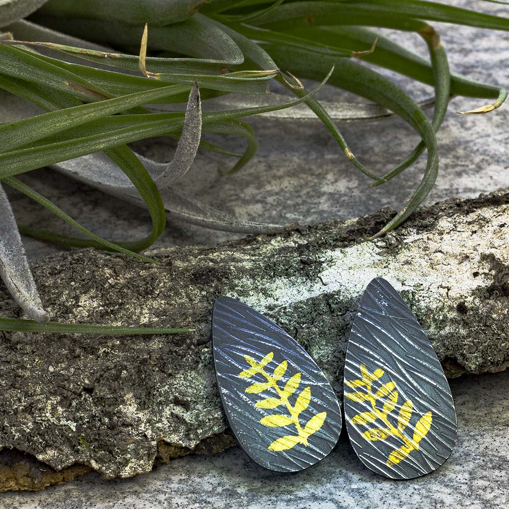Sterling silver and 24k gold Keum Boo earrings with fern design and sterling silver posts, handmade by Divella Designs in Vermont.