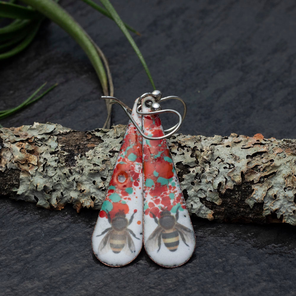 Enamel bee earrings with floral splatter and sterling silver ear wires