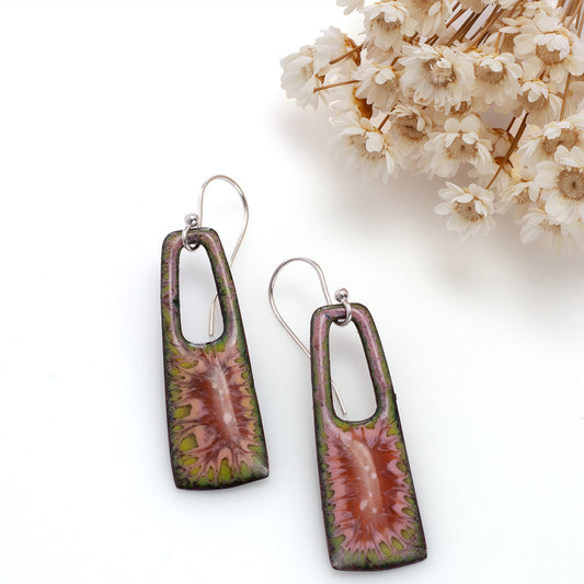 Pink and green enamel earrings with sterling silver ear wires on white background