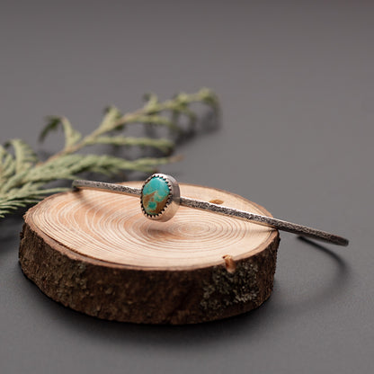 Turquoise from the King's Manassa mine and silver form a petite cuff great for stacking.