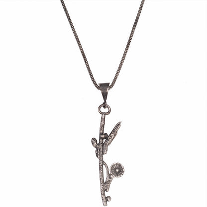 Sterling silver wildflower twig pendant necklace, hand-carved and fused botanical jewelry with oxidized finish.