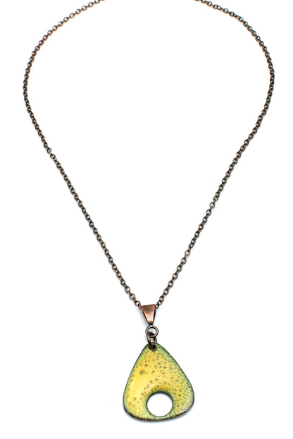 Green enamel copper necklace with triangular pendant, open circle detail, and oxidized copper chain, handmade by Divella Designs in Vermont.