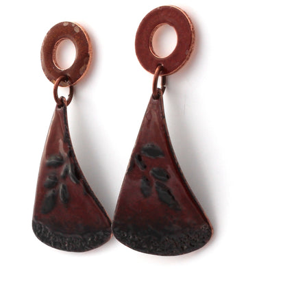 Red and black enamel earrings with textured design and sterling silver posts