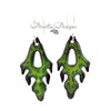 Frond shaped boho earrings in light and dark greens. The ear wires are sterling silver.