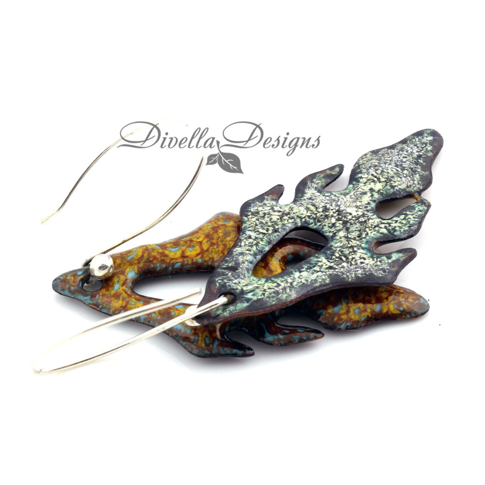 Back image of Pumpkin and yellow frond shaped enamel earrings on a white background by Divella Designs