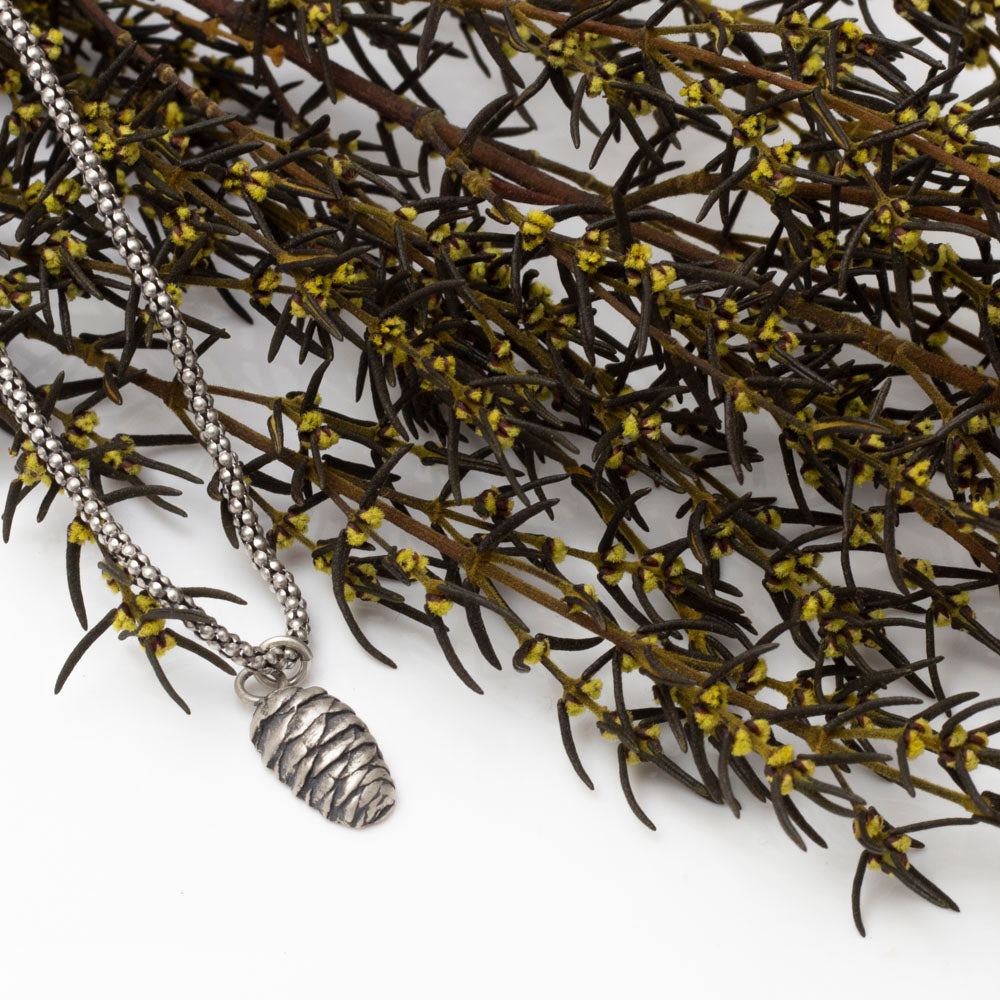 Solid sterling silver pine cone pendant on oxidized bead chain

