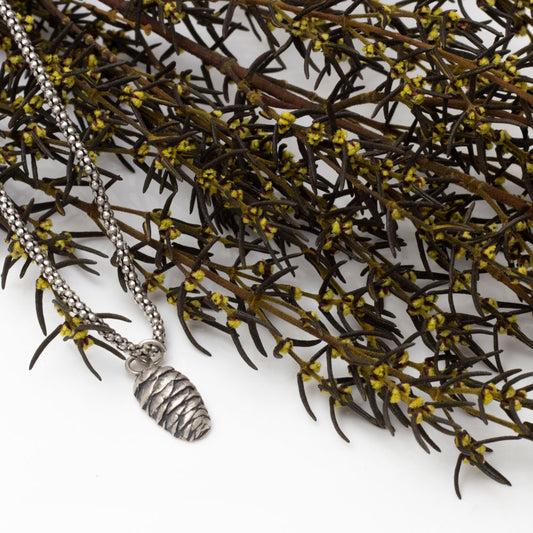 Solid sterling silver pine cone pendant on oxidized bead chain

